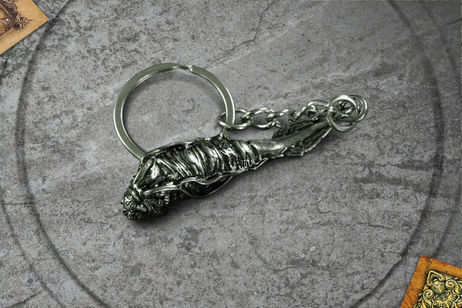 Metallic tadpole keyring