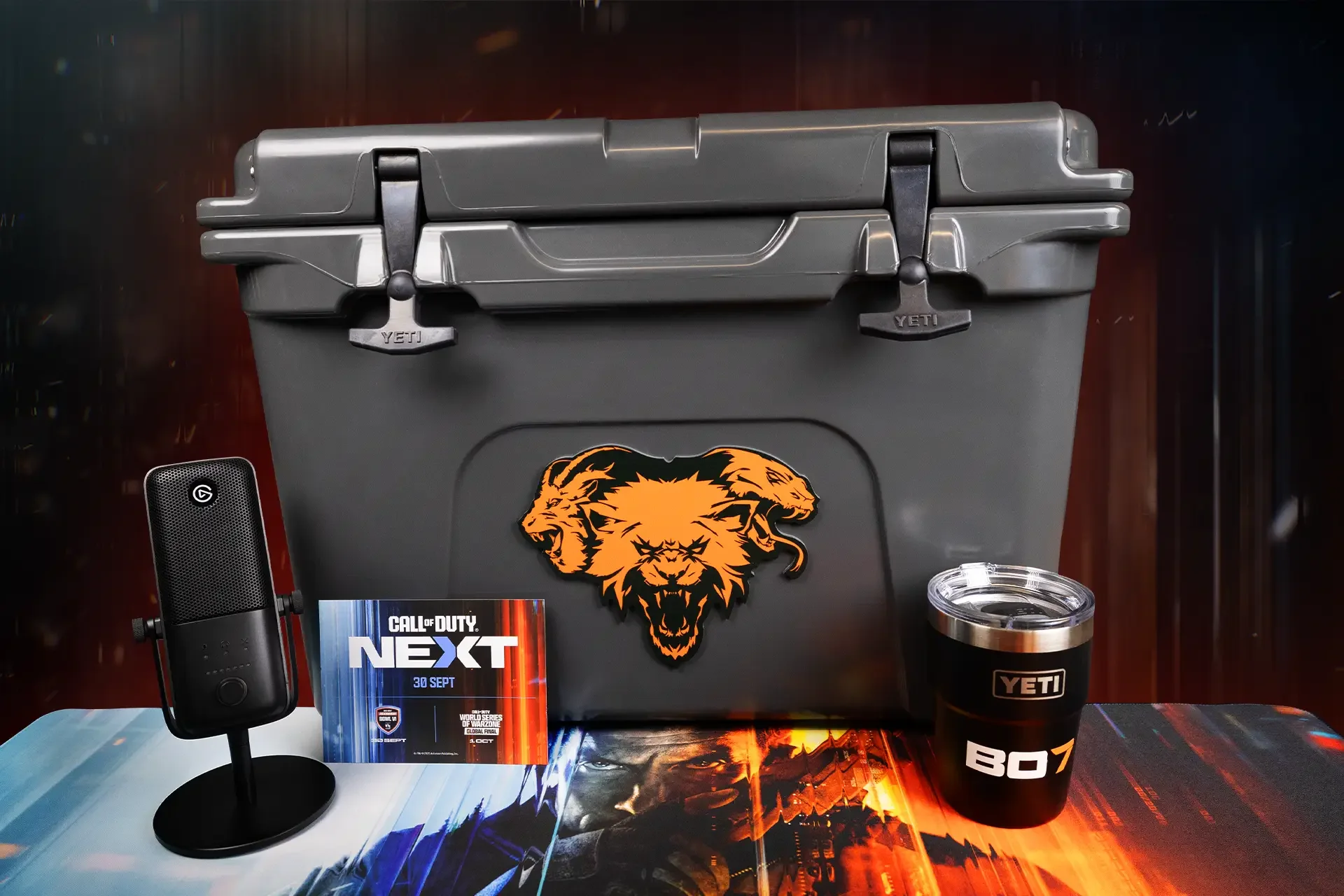Custom Black Ops 7 YETI cooler with the orange three-headed lion emblem, YETI BO7 mug and Elgato microphone