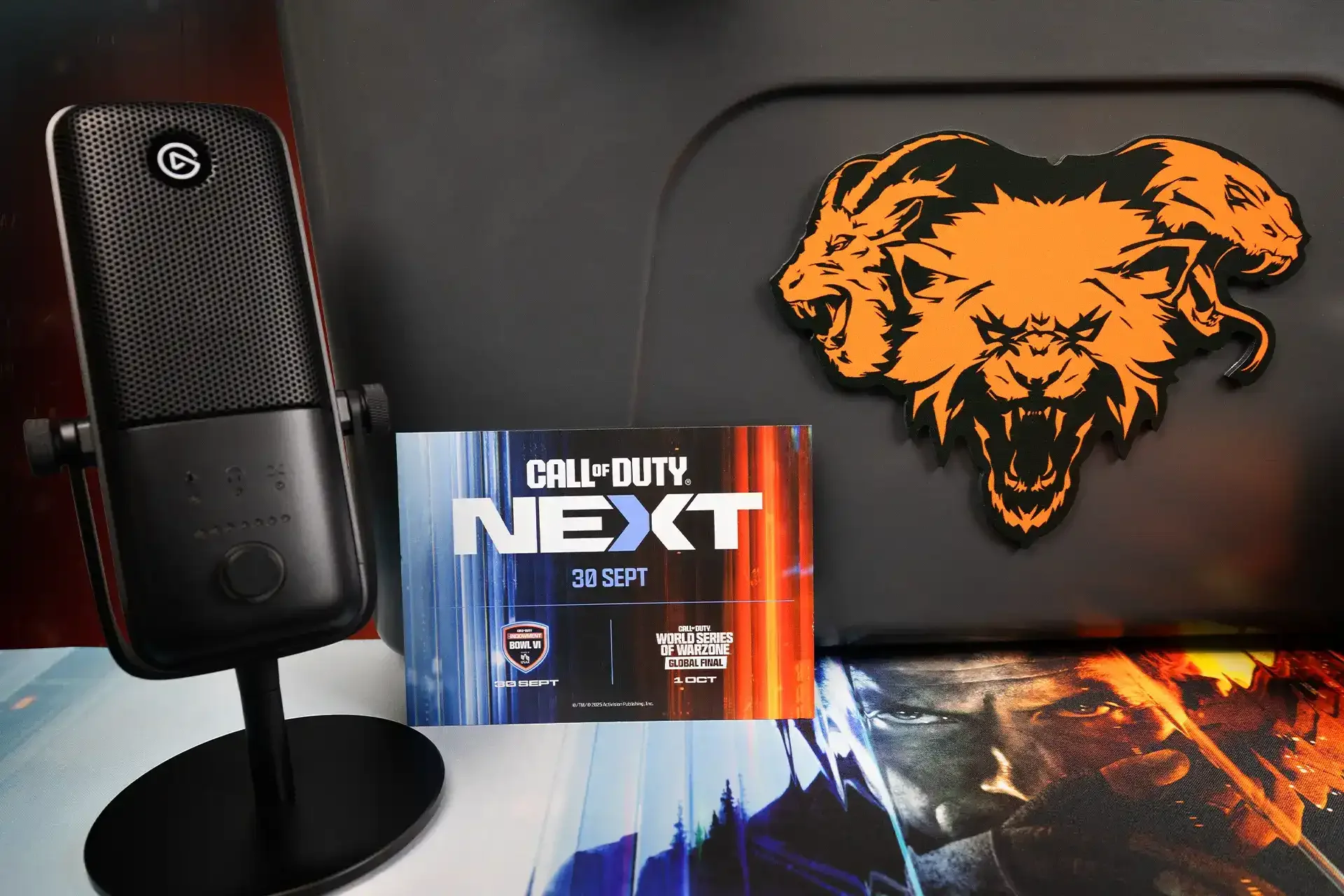Elgato Wave:3 microphone and Call of Duty: Next card in front of the cooler emblem