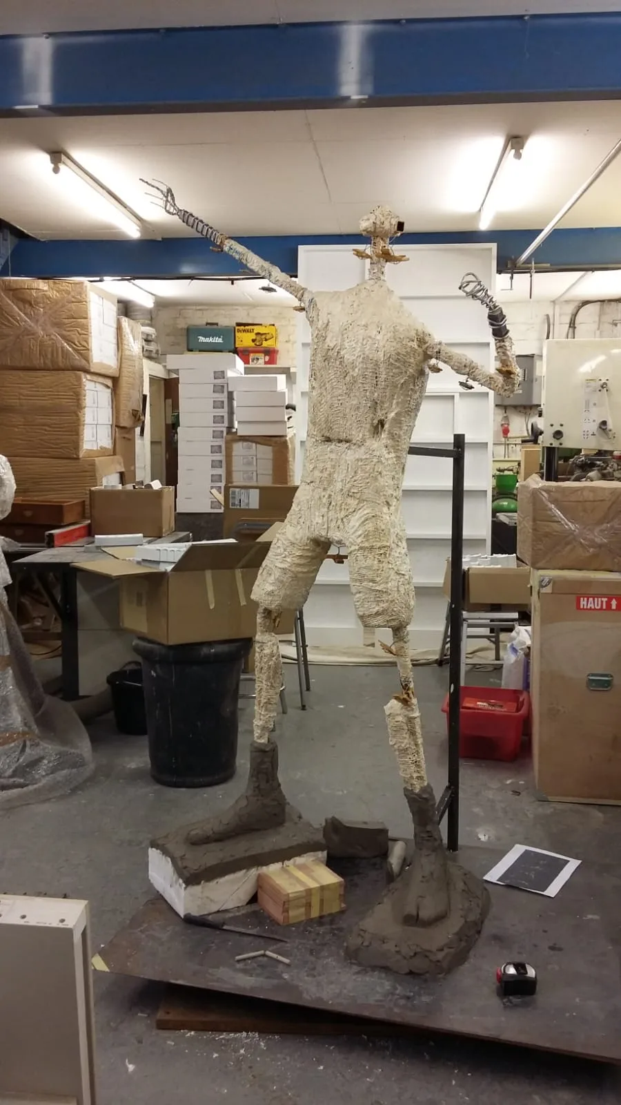 Full-height plaster body before sculpting